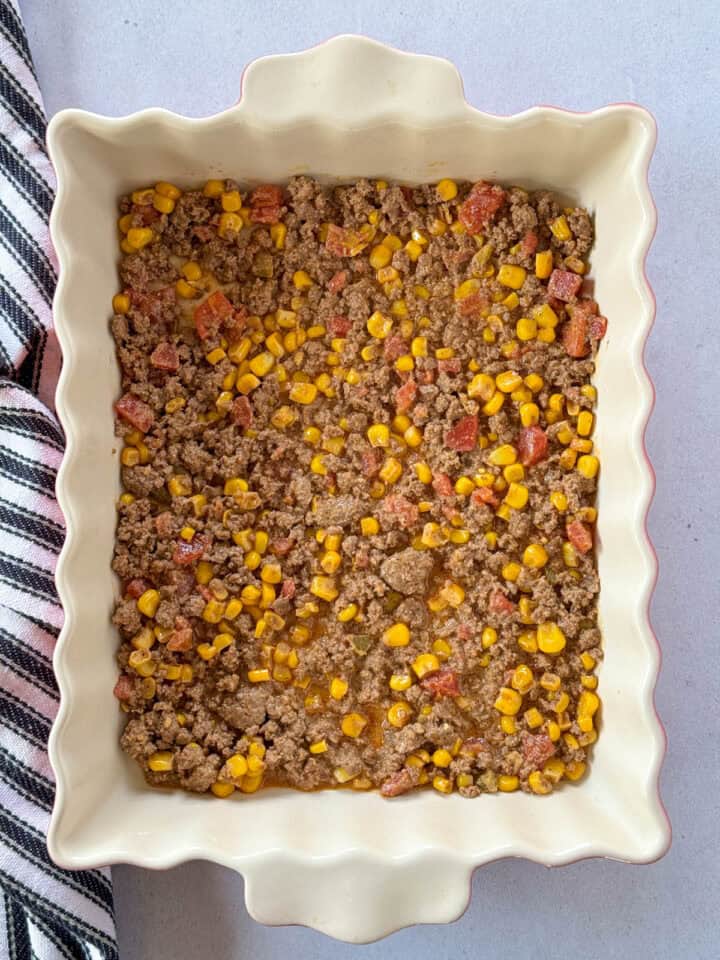 Sauce layer in bottom of casserole dish.