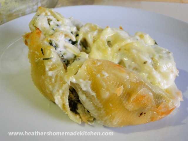 Close up view of four Chicken & Spinach Stuffed Shells