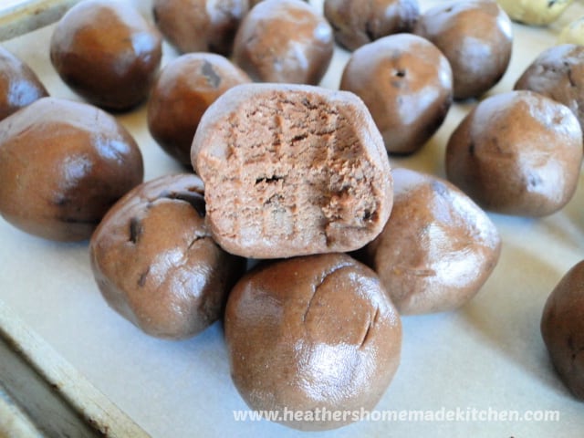 Chocolate Peanut Butter Protein Bites double stacked with bite taken.