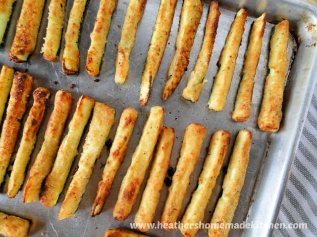 Top view of Air Fryer Zucchini Fries on sheet pan in rows.