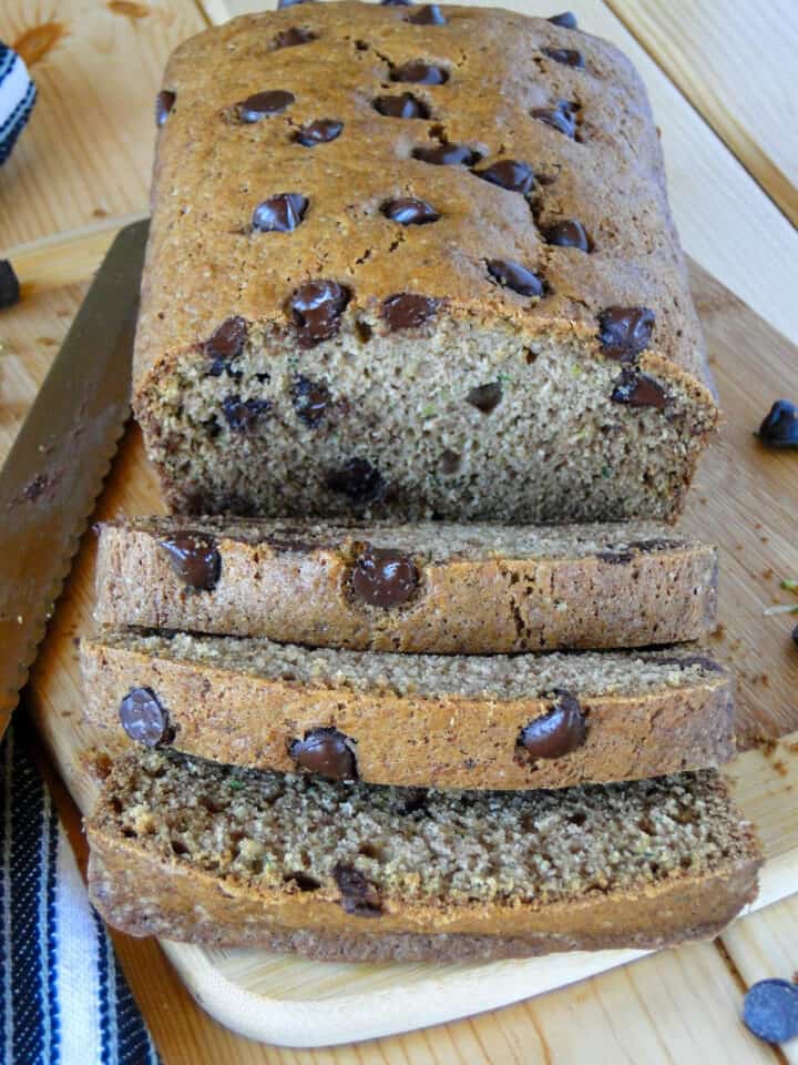 Front view of chocolate chip zucchini bread with 3 slices.