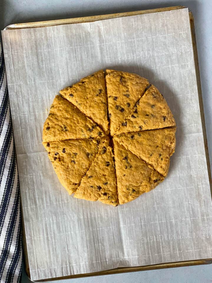 Scone dough cut into 8 wedges.