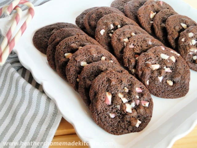 Chocolate Peppermint Drop Cookies in rows on white square platter. 
