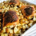 Side view of Pan Roasted Chicken & Potatoes on sheet pan.