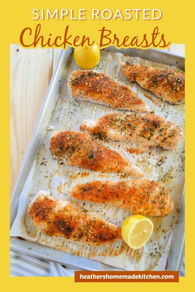 Simple Roasted Chicken Breasts top view on sheet pan with lemons.