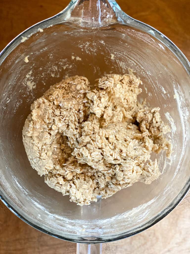 Flour and oats added to creamed mixture.