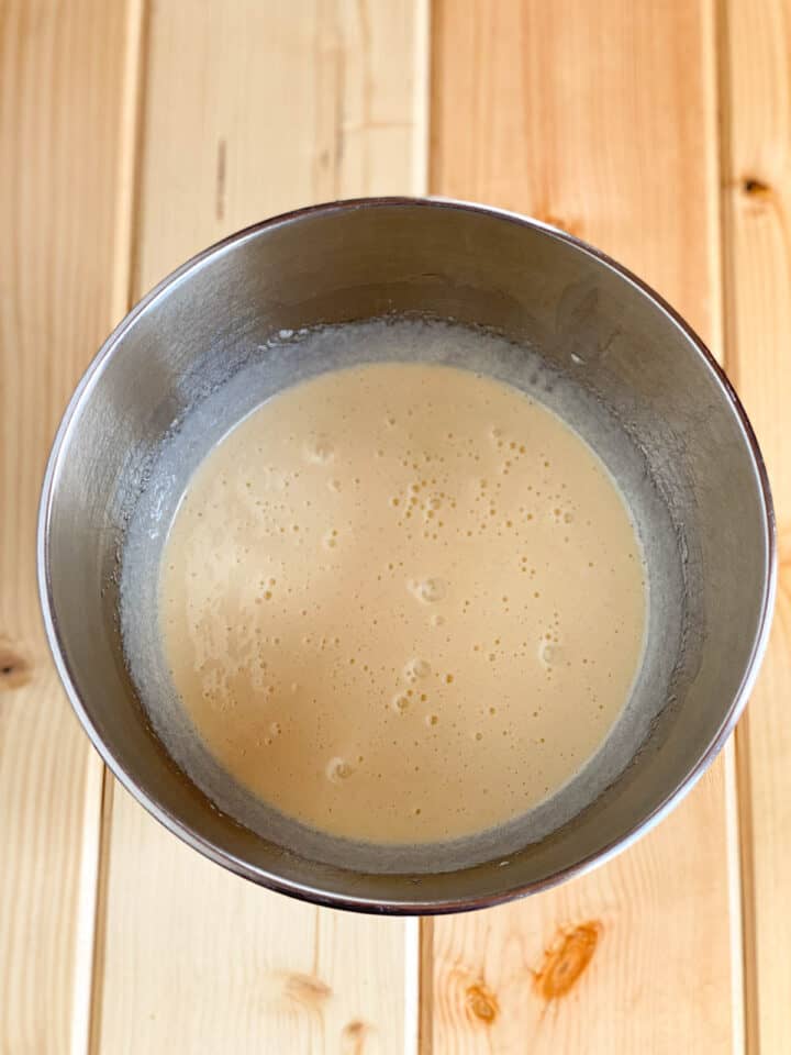 Oil and vanilla added to eggs and sugar in mixing bowl.