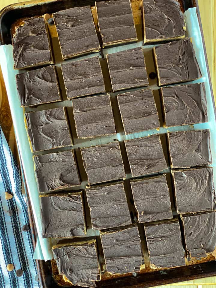 Top view of peanut butter brownie bars sliced on sheet pan.
