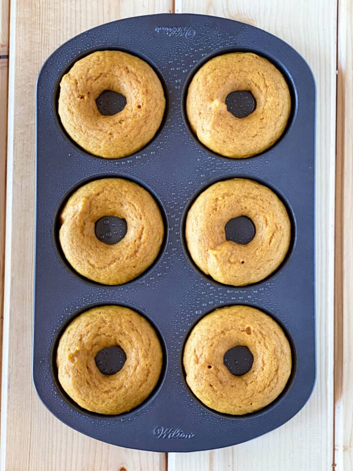 Baked donuts in donut pan.