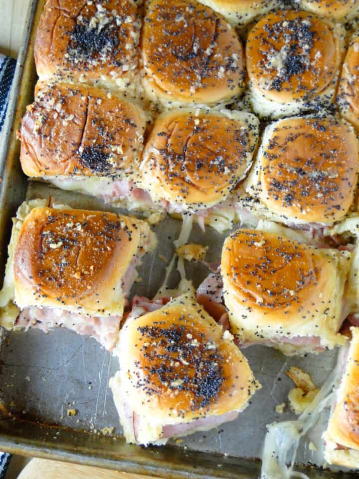 Top view of easy ham and cheese sliders in sheet pan.
