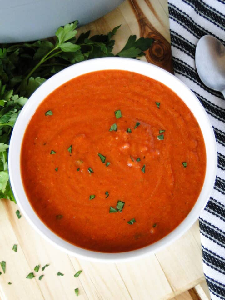 Easy tomato soup in white bowl.