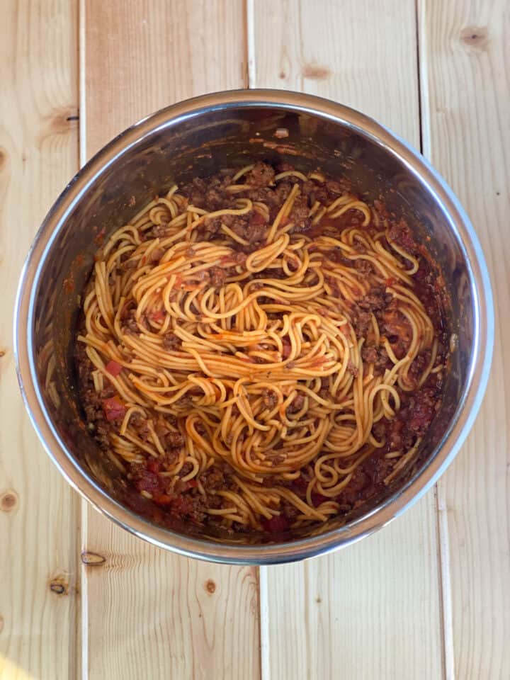 Finished and stirred together spaghetti and meat sauce in instant pot liner.