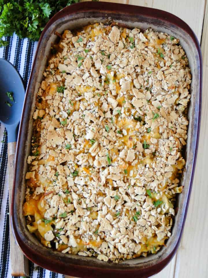 Top view of cheesy tuna noodle casserole in rectangle casserole dish.
