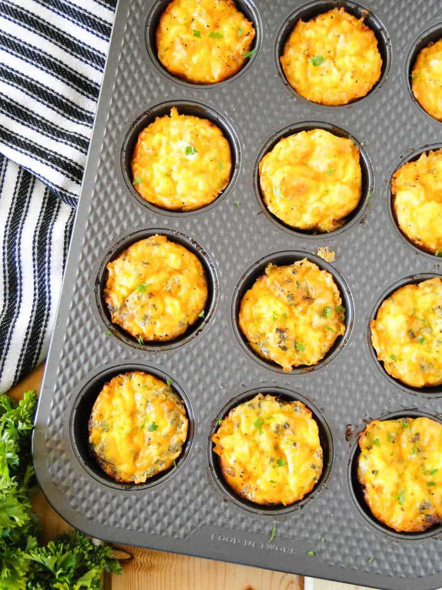Ham and cheese mini frittatas in muffin pan.