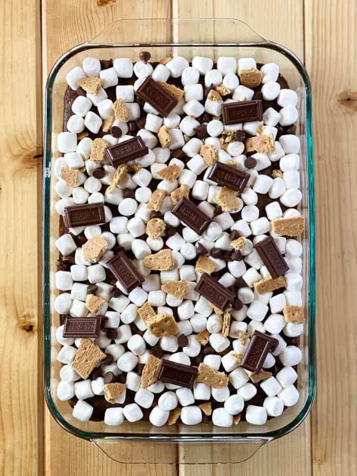 Marshmallows and toppings added to the brownies.