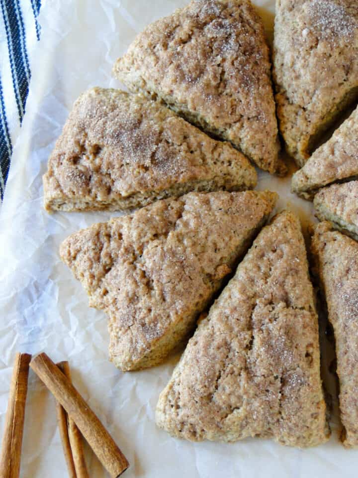 Banana scones in circle on parchment paper.