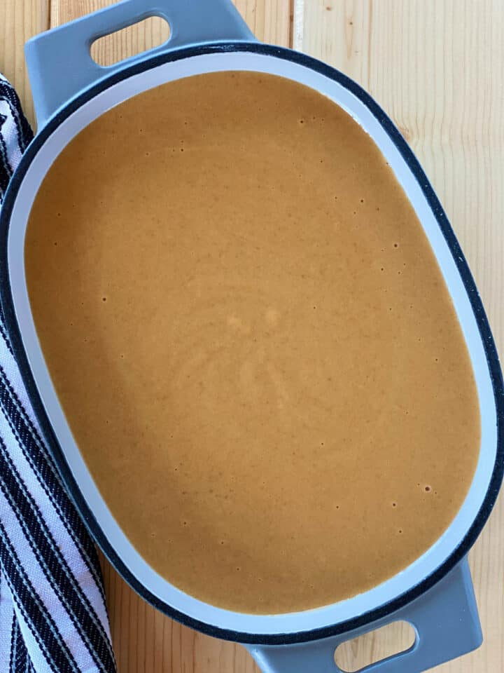 Pumpkin filling in oval baking dish.