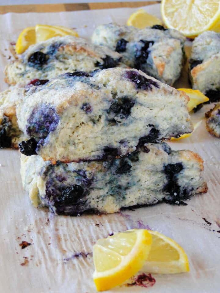 Side view of 2 blueberry scones stacked on top of each other.
