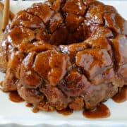 Side view of monkey bread on a white platter.