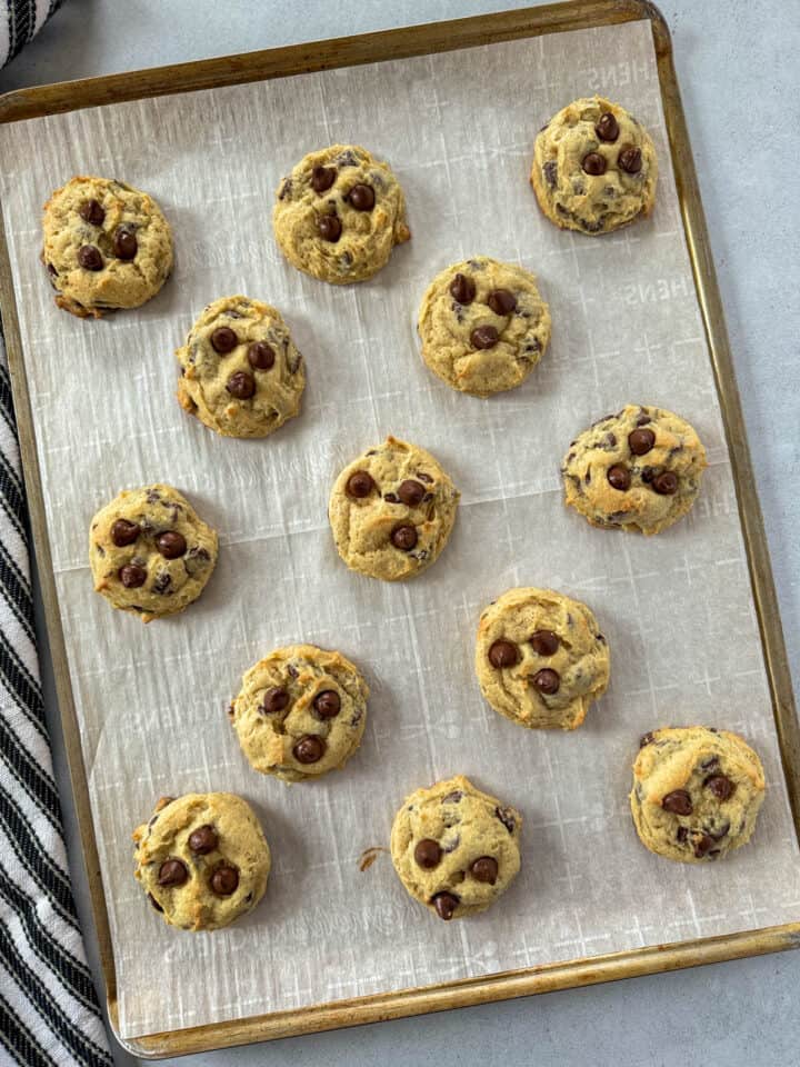 Cookies baked on parchment lined cookie sheet.