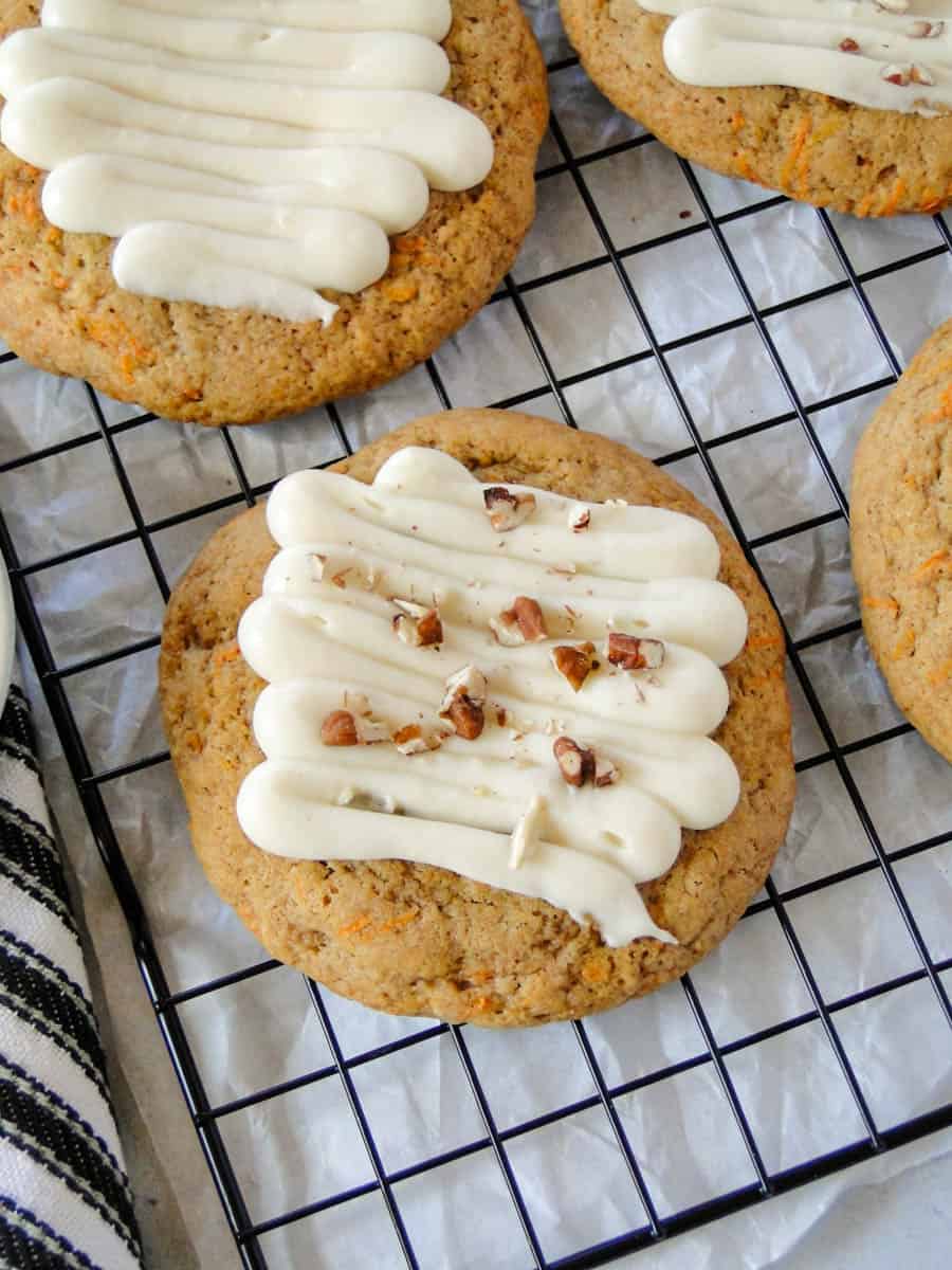 Top close up view of carrot cake cookie on wire rack.
