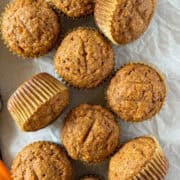 Close up top view of applesauce carrot muffins.