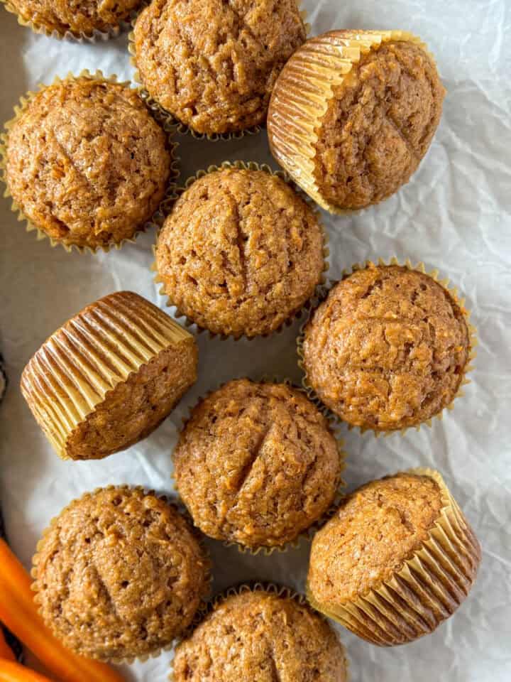 Close up top view of applesauce carrot muffins.