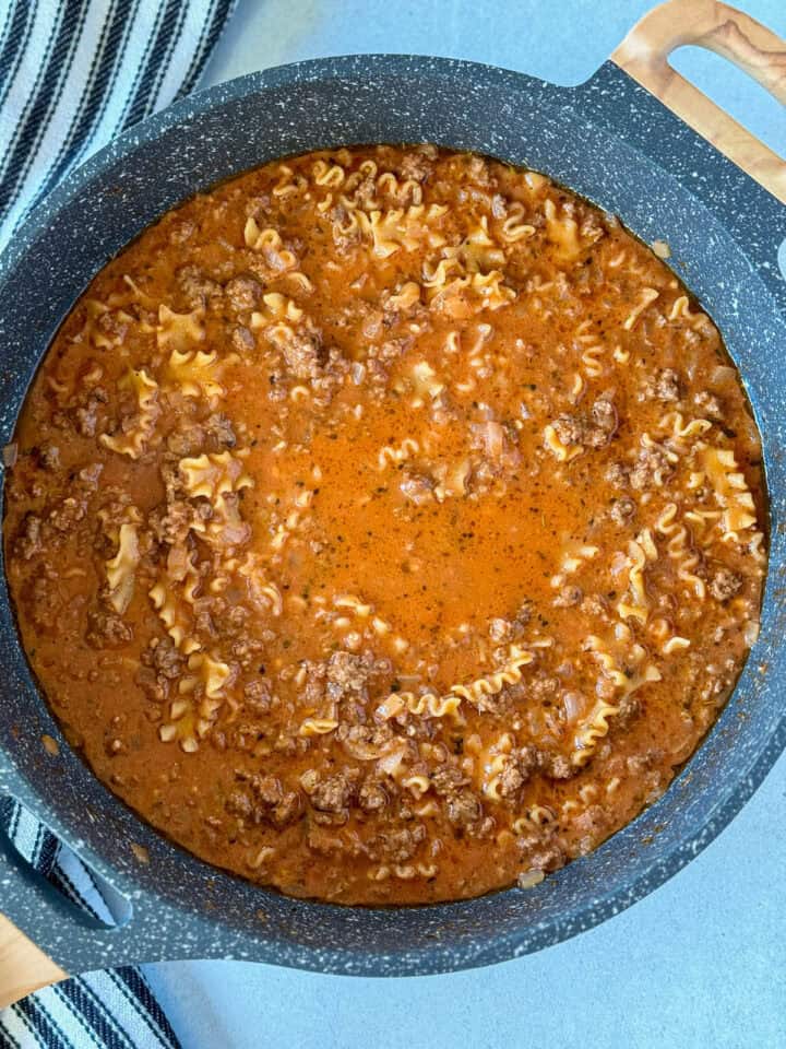 Pasta cooked in lasagna skillet ingredients in large skillet.