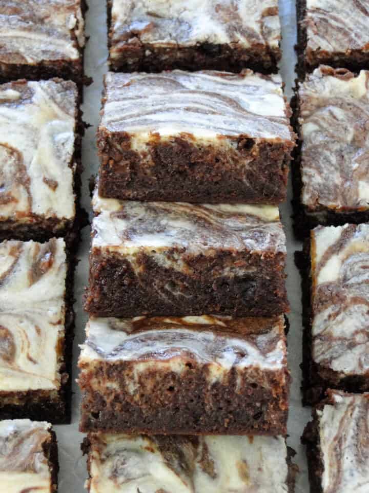 Top view of sliced brownies in a column staggered on top of each other.