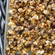 Top view of scotcharoo popcorn on sheet pan.