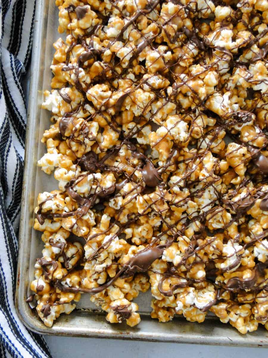 Top view of scotcharoo popcorn on sheet pan.