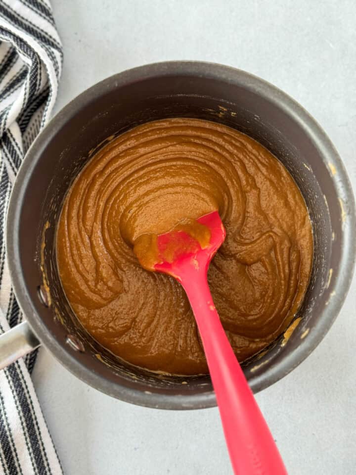 Peanut butter, honey and brown sugar melted together in medium saucepan.