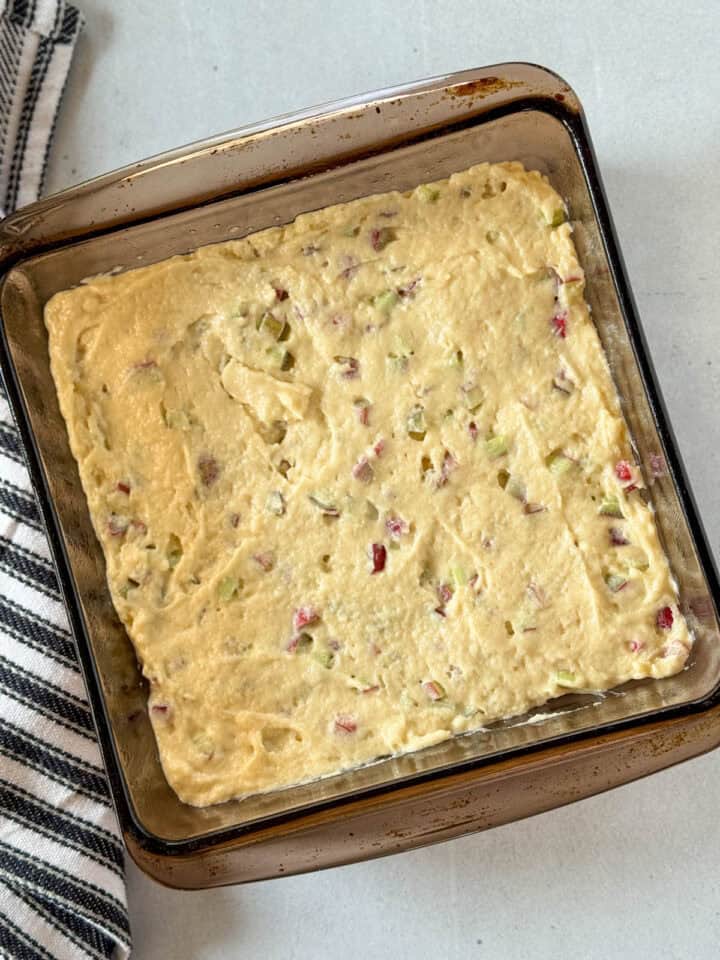 Batter spread into an even layer in baking dish.