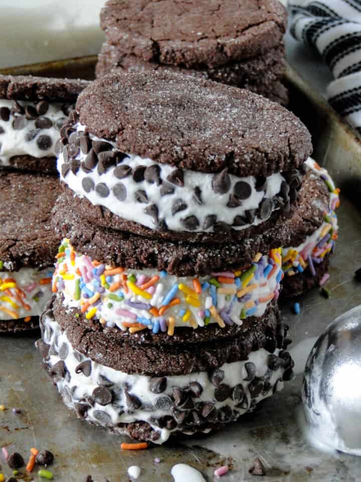 Three ice cream cookie sandwiches stacked.