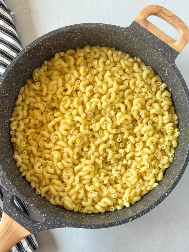 Cooked pasta in skillet.