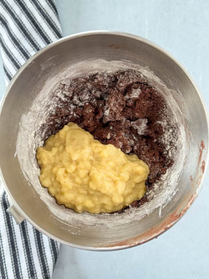 Mashed bananas added to batter in large mixing bowl.