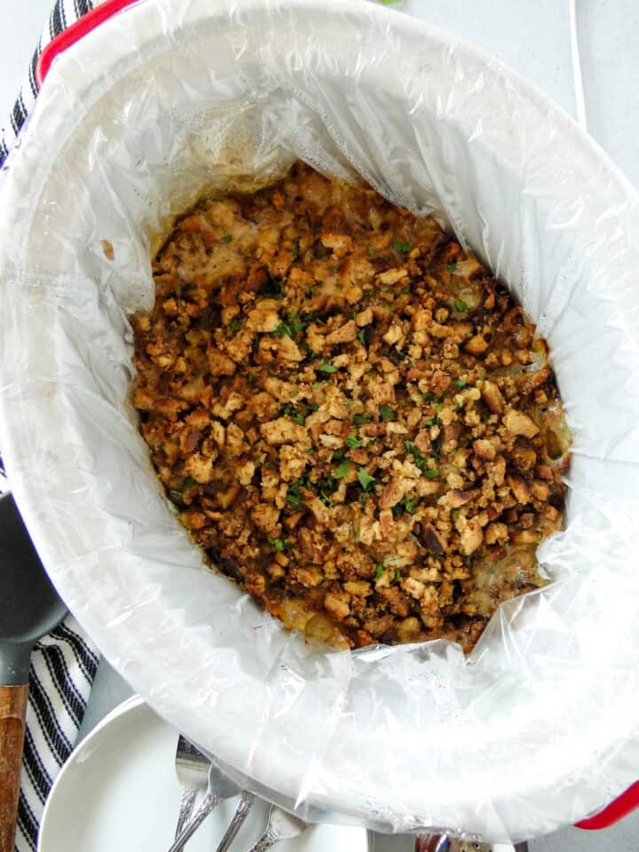 Cooked crock pot chicken and stuffing in crock pot.