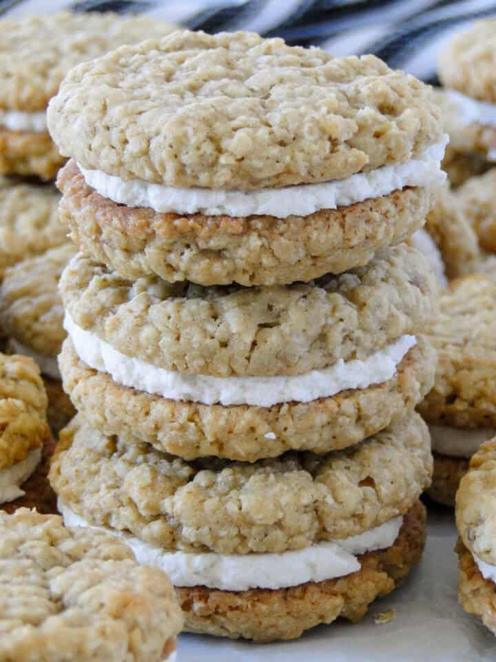 Side view of three oatmeal cream pies stacked.